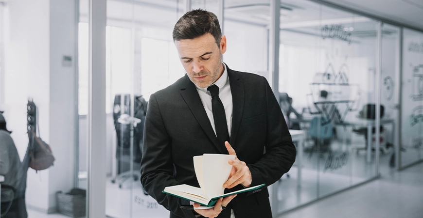 Management accounts report with financial charts and graphs on a desk — UK business finance overview